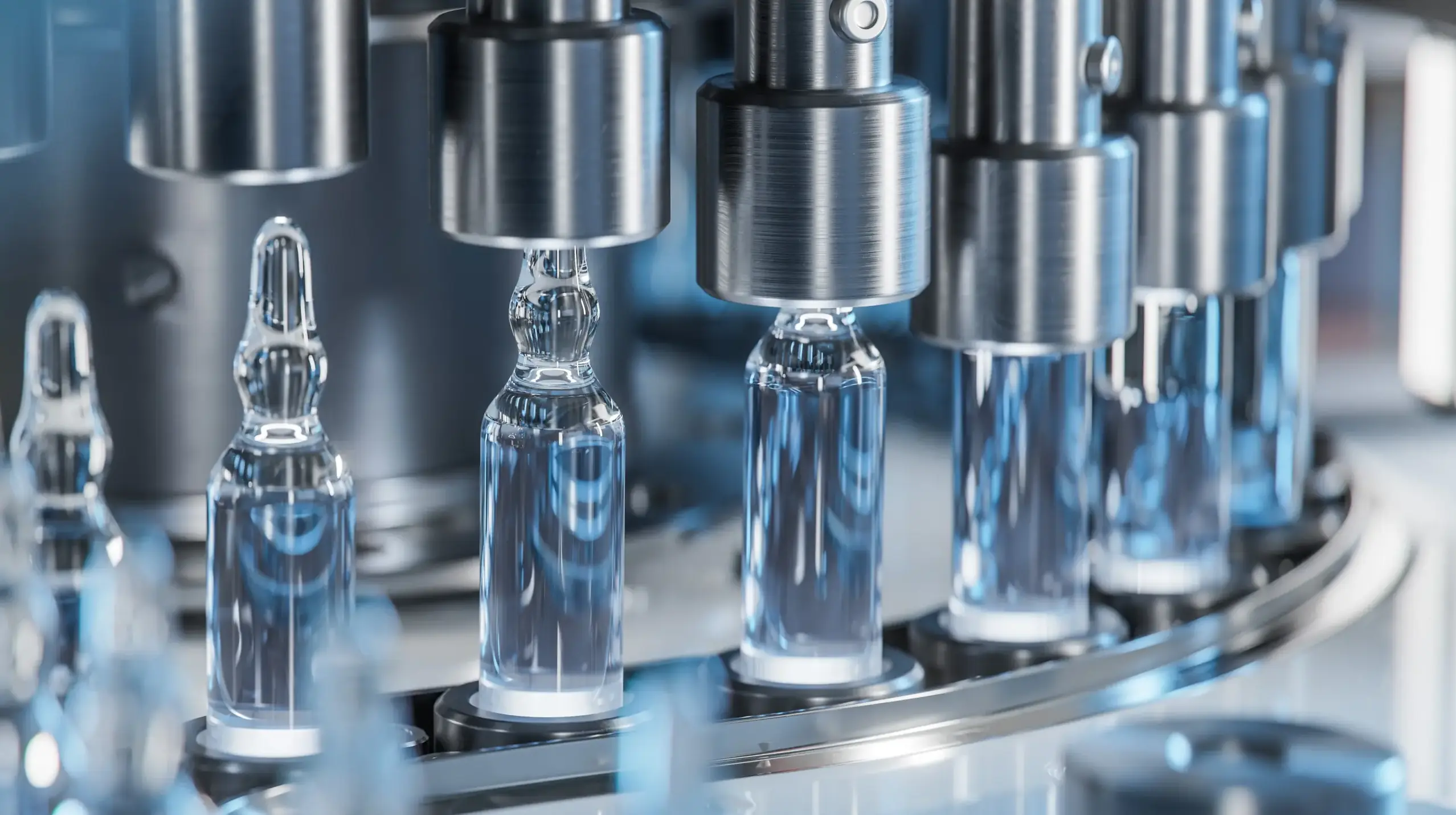 glass bottles being shaped by a machine